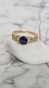 Round Blue Stone with Twisted Crystal Accents - Artificial Yellow Gold